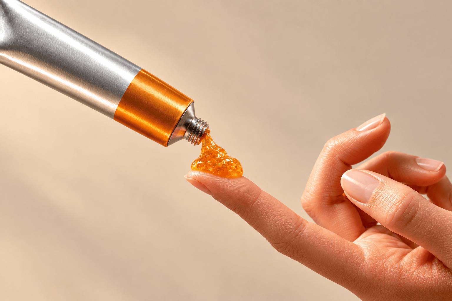 Dabbing the Mango Soleil tube onto a fingertip